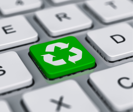 computer keyboard with recycling logo button